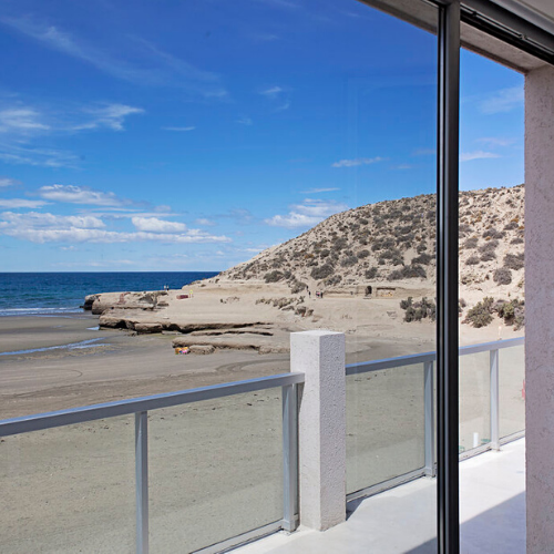 Photo of a beach from a hotel room in Argentina.
